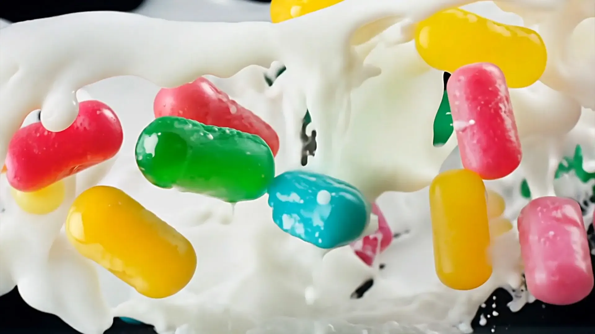 Bright Colorful Candy in Liquid Flow Transition for Playful Video Animations